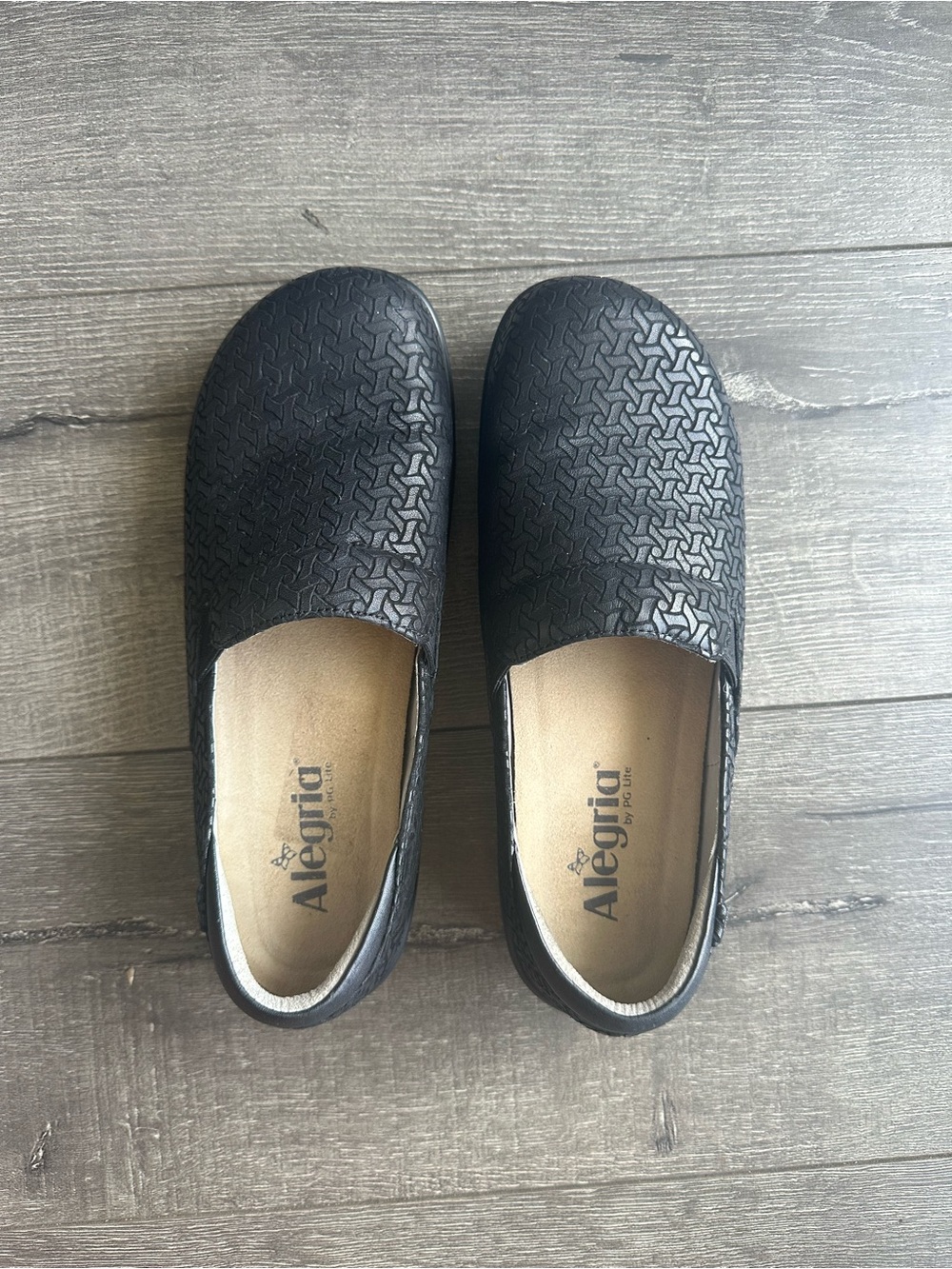Alegria Black Textured Slip-Ons